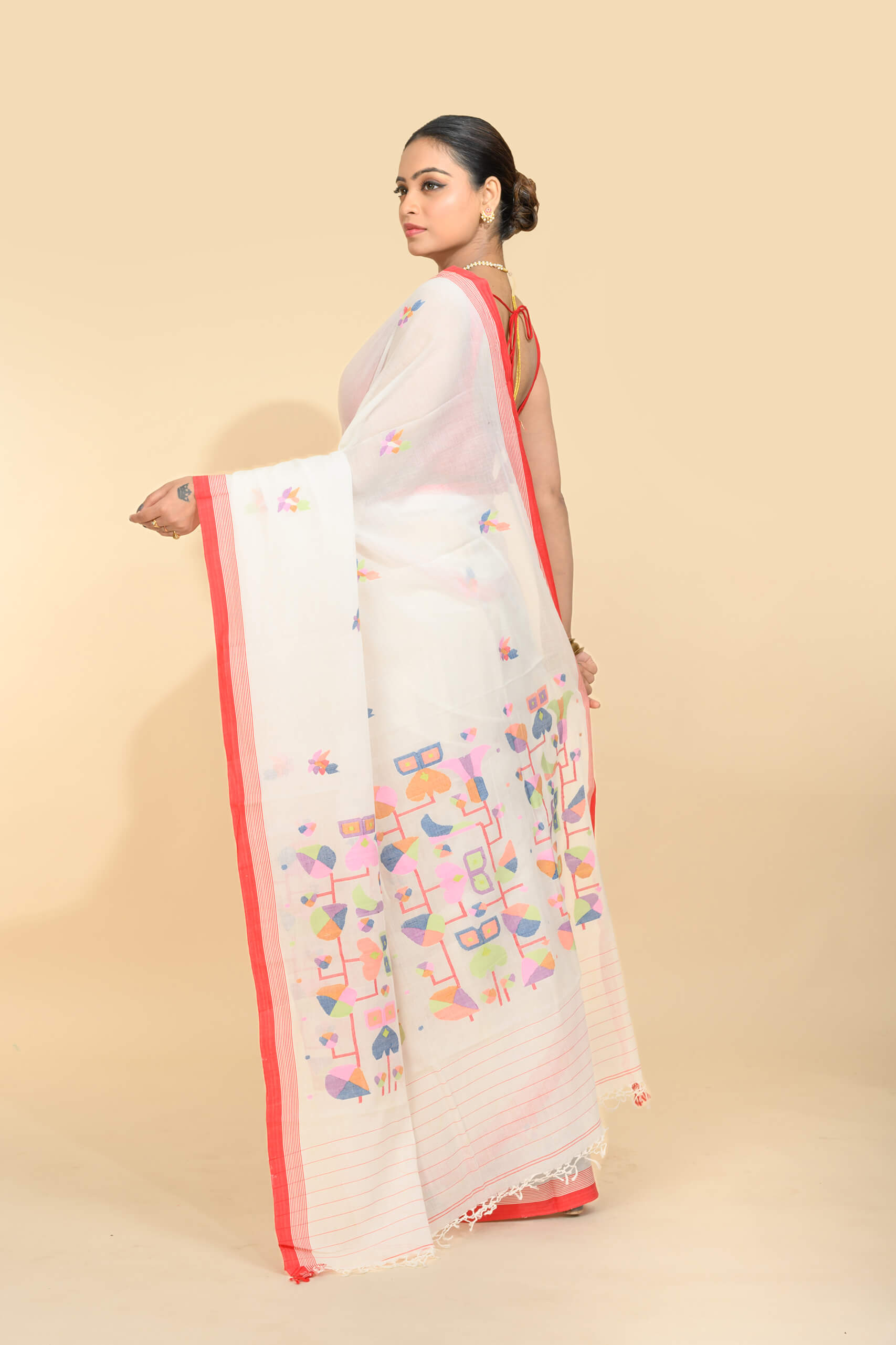Tantvithi Banshree White Jamdani Saree handloom saree with colorful woven motifs