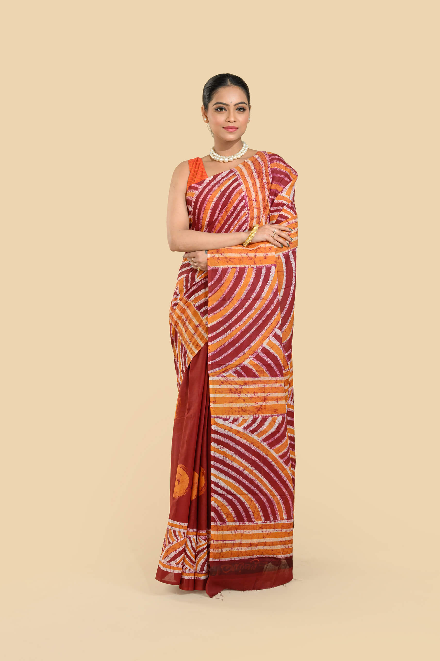 Maroon Cotton Batik Saree by Tantvithi with orange and white patterns