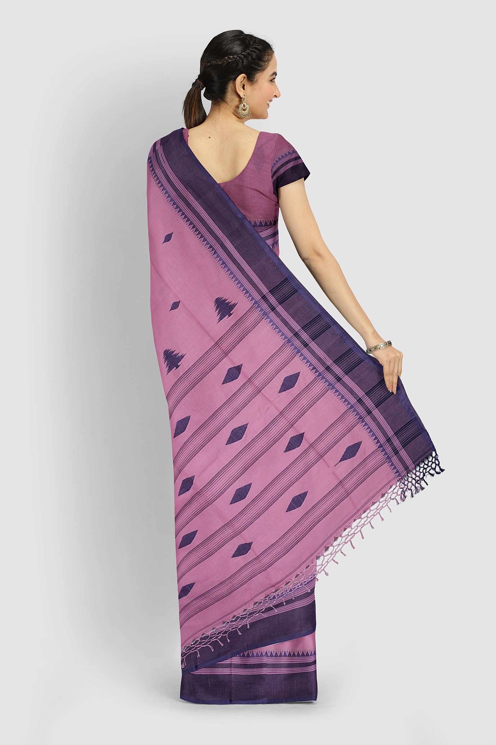Peach Tangail cotton saree with handwoven border draped elegantly