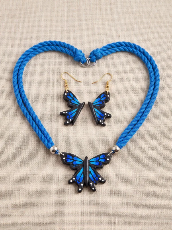 Peacock blue terracotta earrings with hand-painted butterfly motif