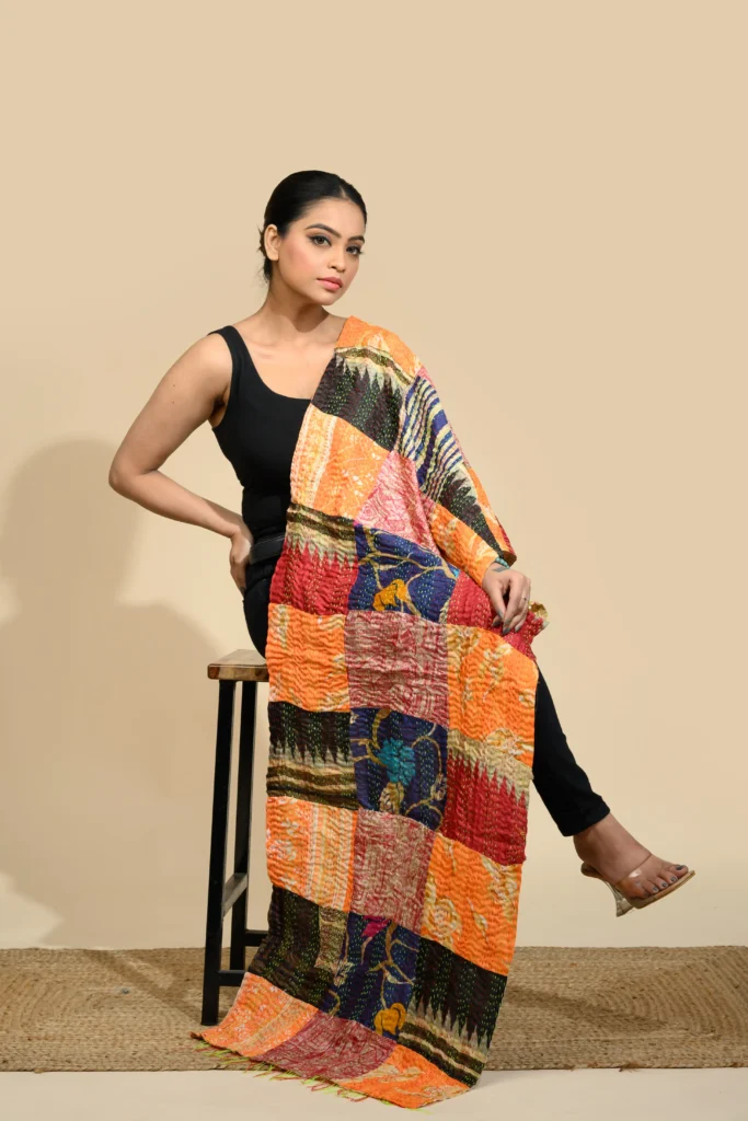 Rust orange Kantha stole with black check pattern and hand embroidery