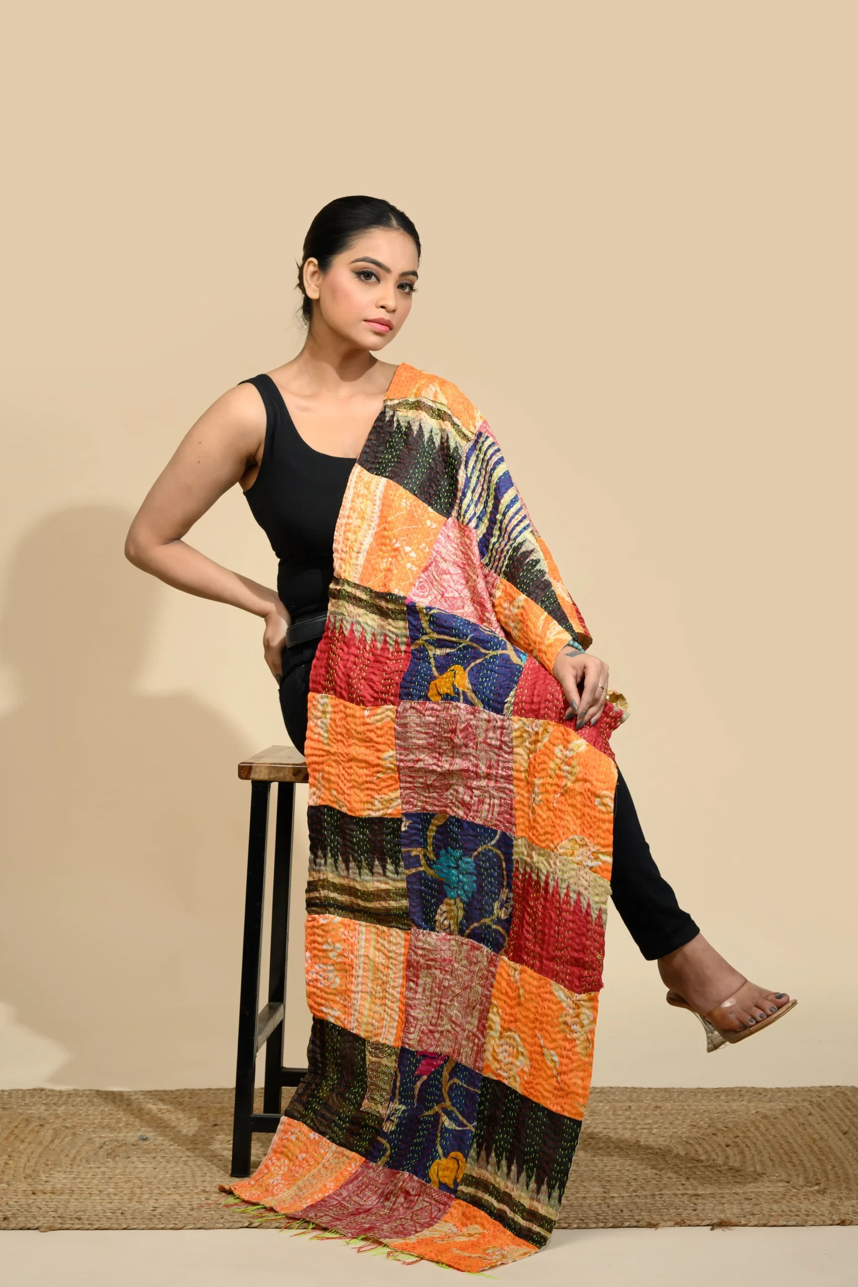 Rust orange Kantha stole with black check pattern and hand embroidery